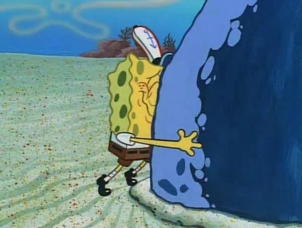 SpongeBob hugging a boulder